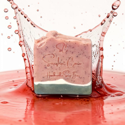 Handmade watermelon soap bar with shea butter, poppy seeds and kaolin clay for gentle exfoliation and nourishing skincare by Snuzhat Care