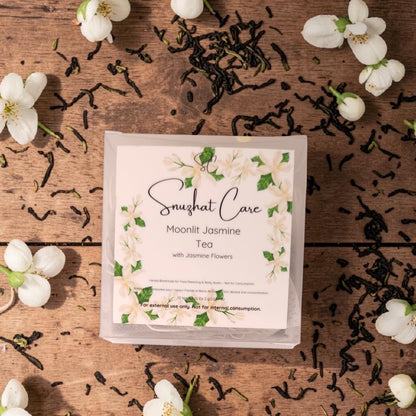 Luxury botanical bath tea soak bags with dried jasmine, hibiscus, rose, calendula and chamomile flowers for relaxing bath soaks, foot soaks and spa self-care rituals by Snuzhat Care