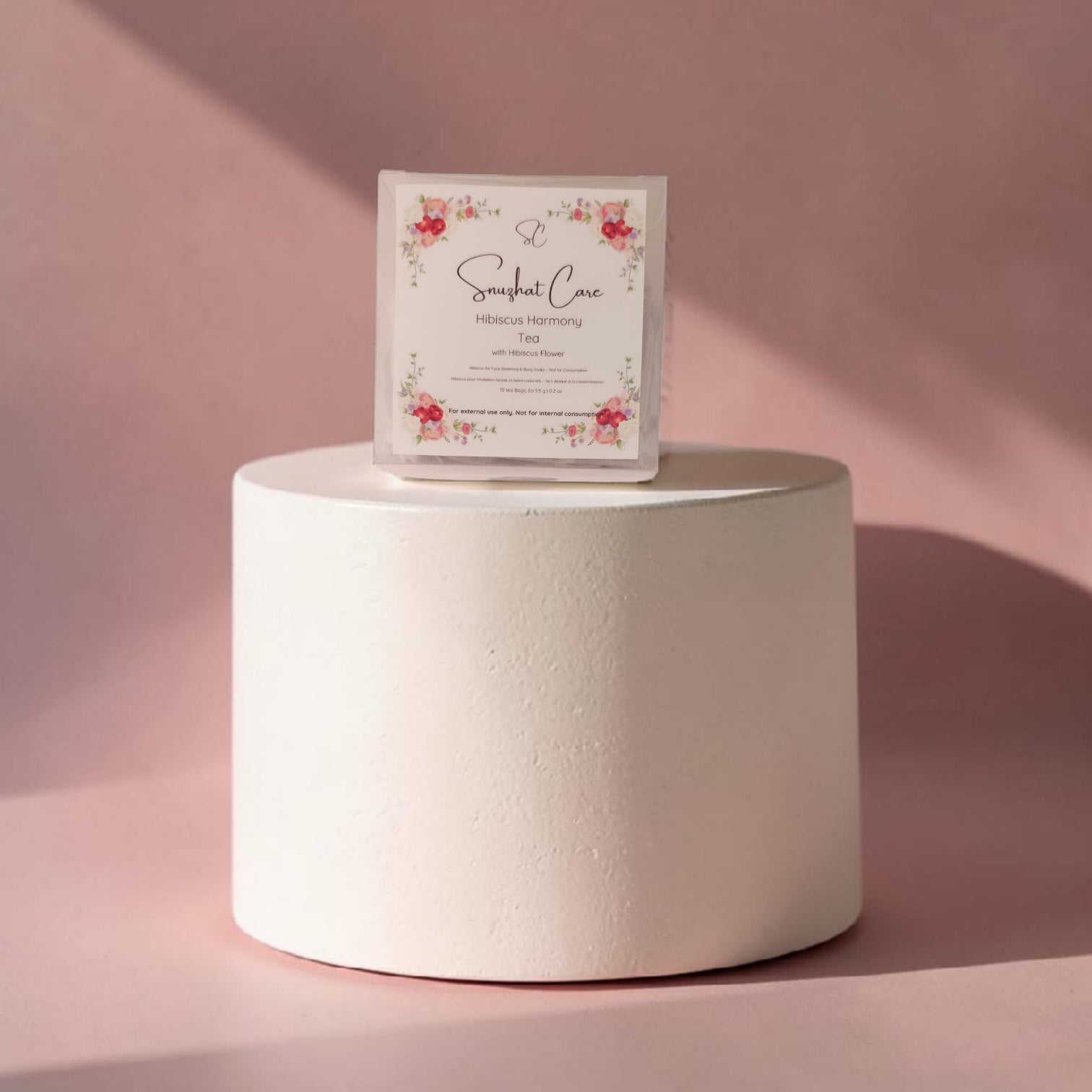 Luxury botanical bath tea soak bags with dried jasmine, hibiscus, rose, calendula and chamomile flowers for relaxing bath soaks, foot soaks and spa self-care rituals by Snuzhat Care