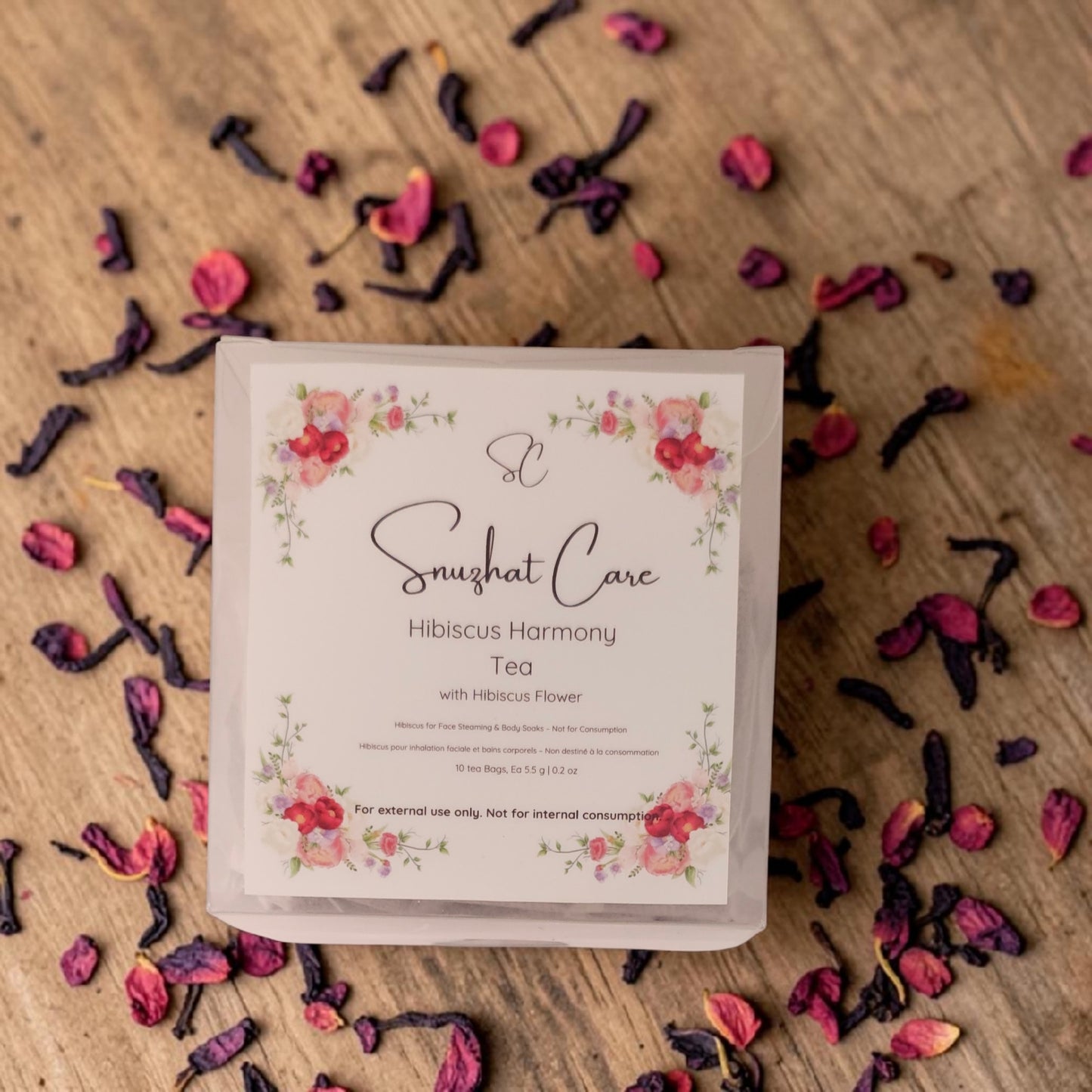 Luxury botanical bath tea soak bags with dried jasmine, hibiscus, rose, calendula and chamomile flowers for relaxing bath soaks, foot soaks and spa self-care rituals by Snuzhat Care