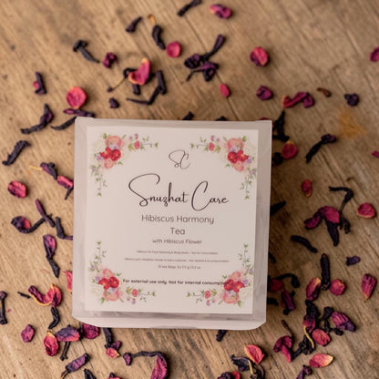 Luxury botanical bath tea soak bags with dried jasmine, hibiscus, rose, calendula and chamomile flowers for relaxing bath soaks, foot soaks and spa self-care rituals by Snuzhat Care
