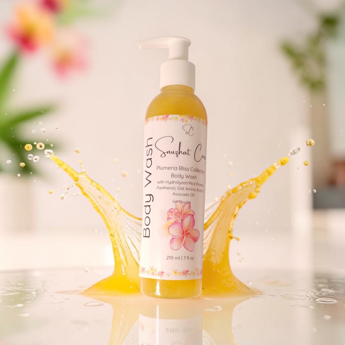 Luxury plumeria body and bath collection featuring body wash, body butter, scrub, bath salts, bath bombs and handmade soap for tropical spa self-care by Snuzhat Care