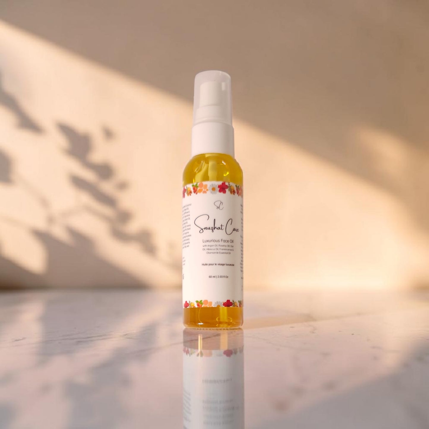 Luxury botanical face oil with rosehip oil, squalane, argan oil and jojoba oil for radiant hydrated skincare and self-care rituals by Snuzhat Care