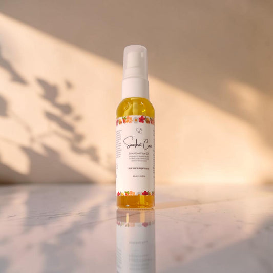Luxury botanical face oil with rosehip oil, squalane, argan oil and jojoba oil for radiant hydrated skincare and self-care rituals by Snuzhat Care