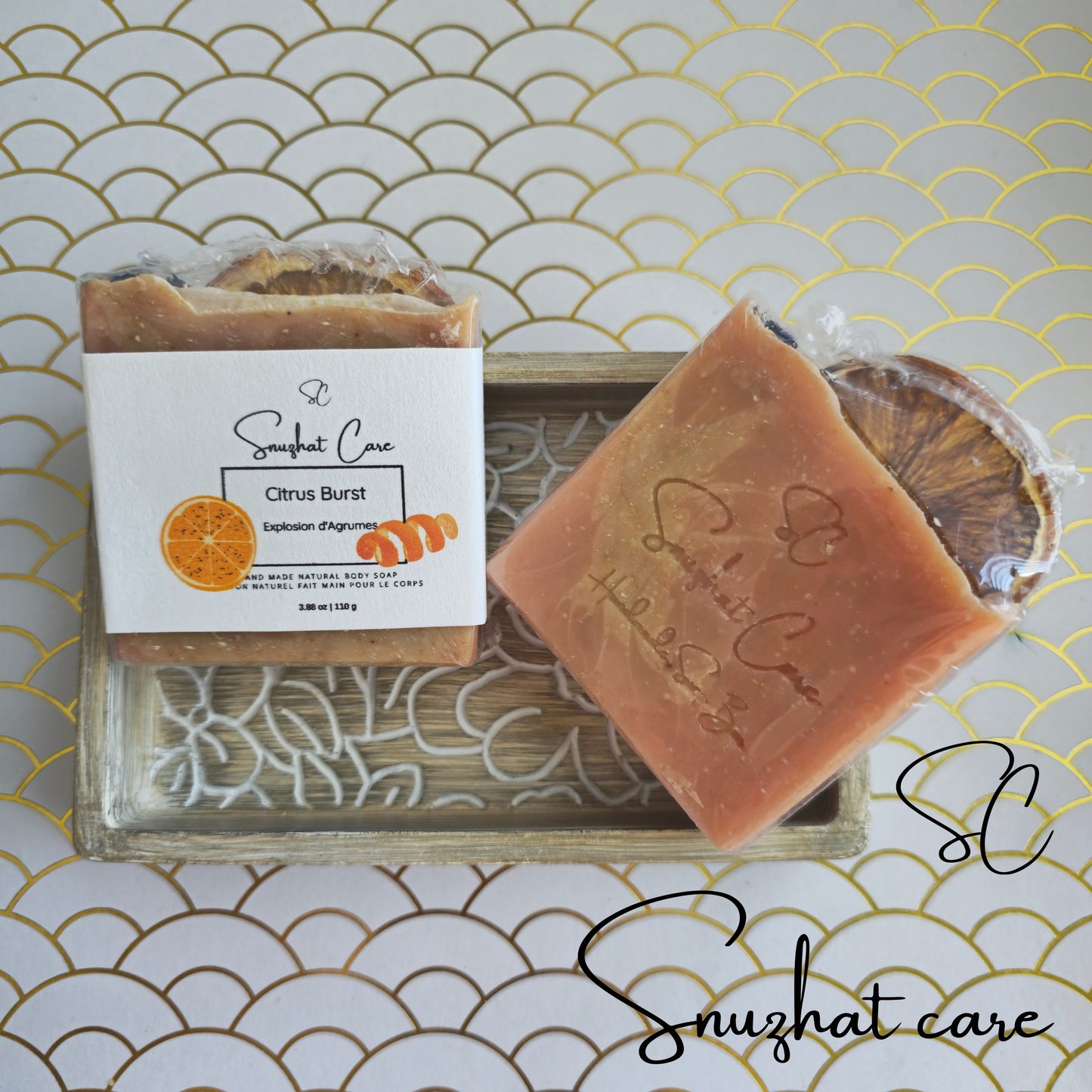Handmade citrus soap bar with orange peel powder, shea butter, kaolin clay and botanical oils for refreshing skincare and self-care rituals by Snuzhat Care