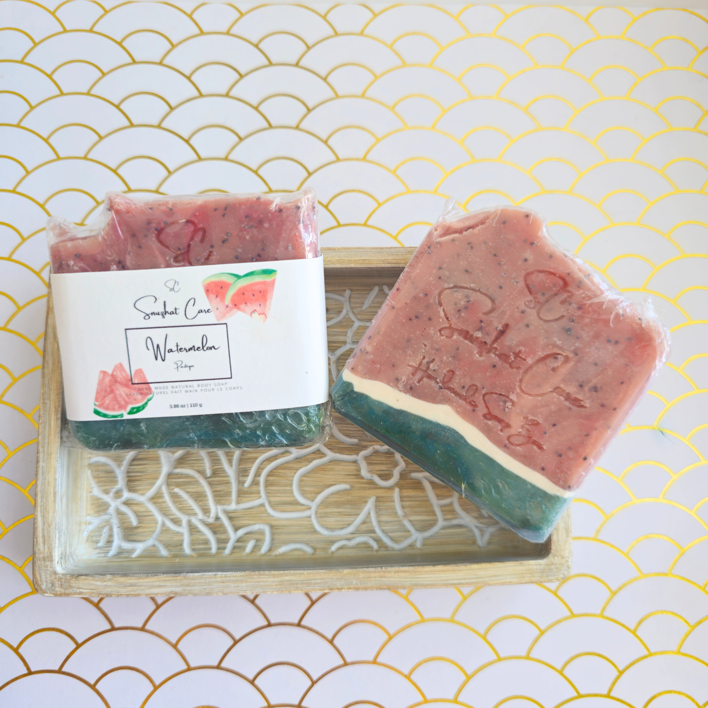 Handmade watermelon soap bar with shea butter, poppy seeds and kaolin clay for gentle exfoliation and nourishing skincare by Snuzhat Care