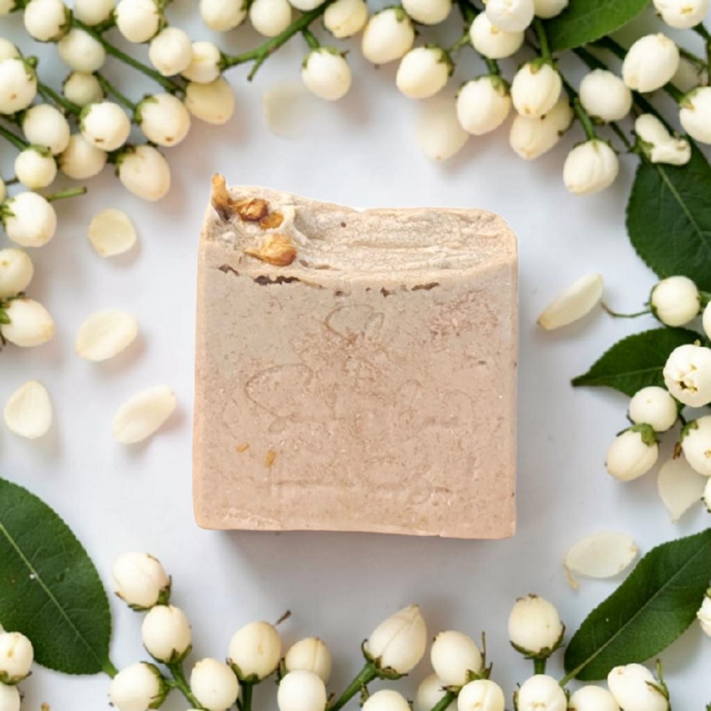 Handmade jasmine soap bar with shea butter, kaolin clay and botanical oils for luxurious floral skincare and self-care rituals by Snuzhat Care
