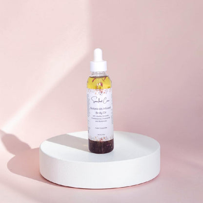 Luxury botanical body oil with squalane, jojoba oil, floral botanicals and essential oils for radiant hydrated skin and spa self-care rituals by Snuzhat Care