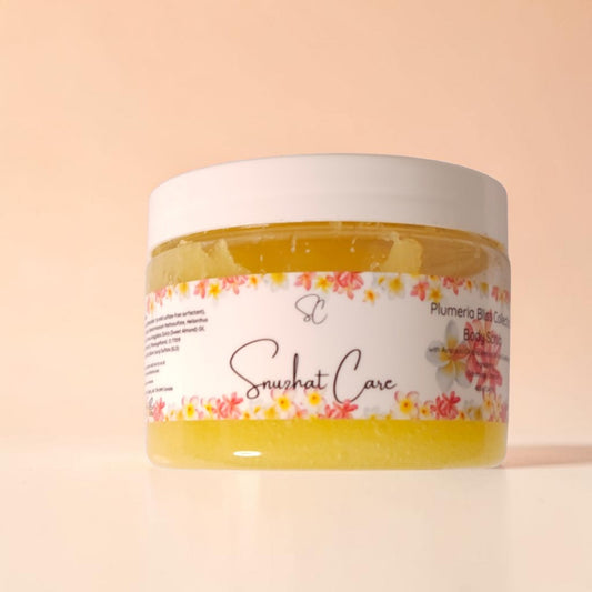 Luxury plumeria sugar body scrub with avocado oil, sweet almond oil and sunflower oil for tropical exfoliating body care and self-care rituals by Snuzhat Care