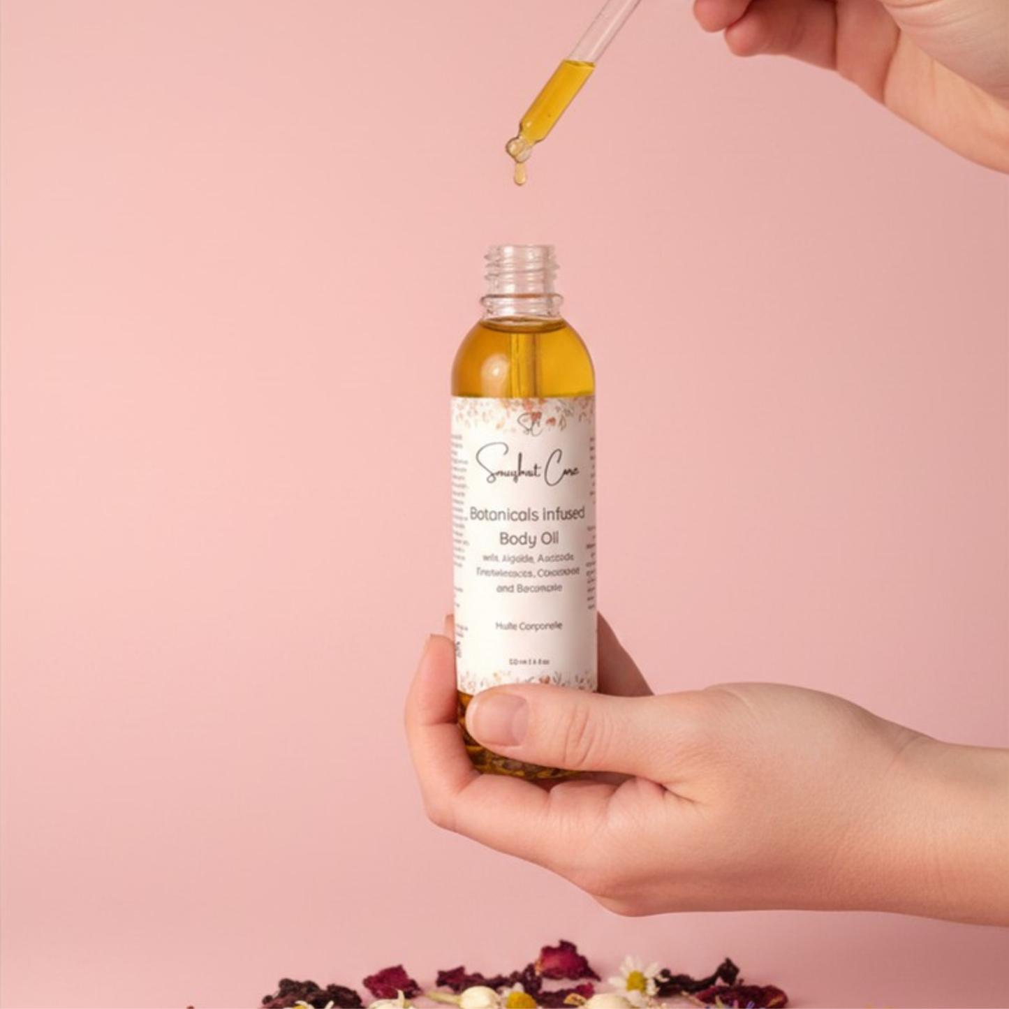 Luxury botanical body oil with squalane, jojoba oil, floral botanicals and essential oils for radiant hydrated skin and spa self-care rituals by Snuzhat Care